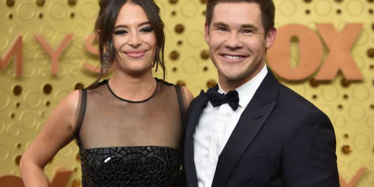 Actor Adam DeVine and actress Chloe Bridges have tied the knot